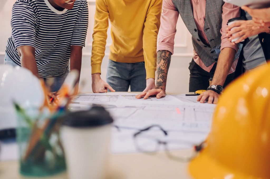 multiracial-team-of-architects-having-a-meeting
